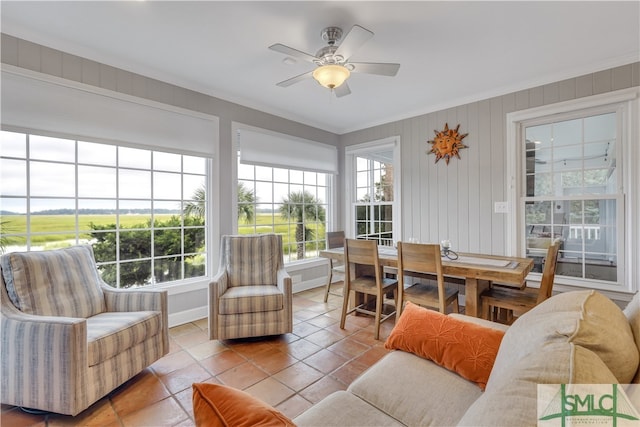 sunroom / solarium with ceiling fan