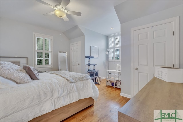 bedroom featuring light hardwood / wood-style flooring and ceiling fan