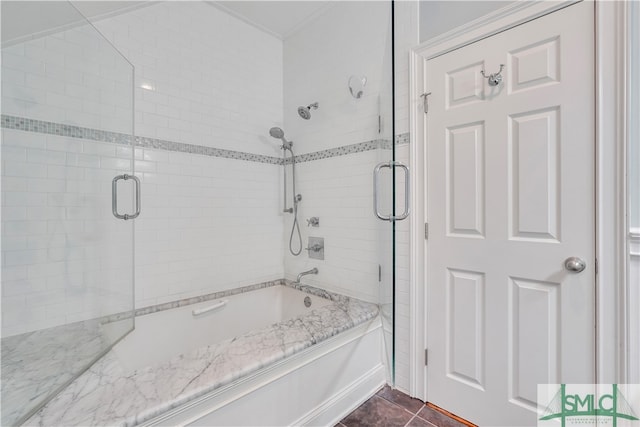 bathroom with shower / bath combination with glass door