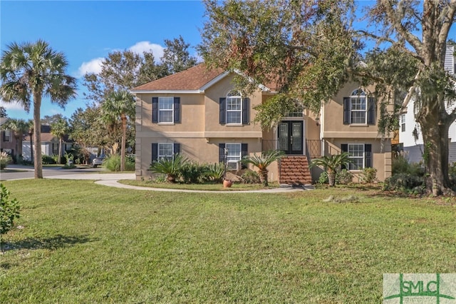 bi-level home featuring a front yard