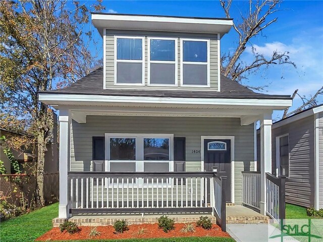 view of front of property featuring covered porch