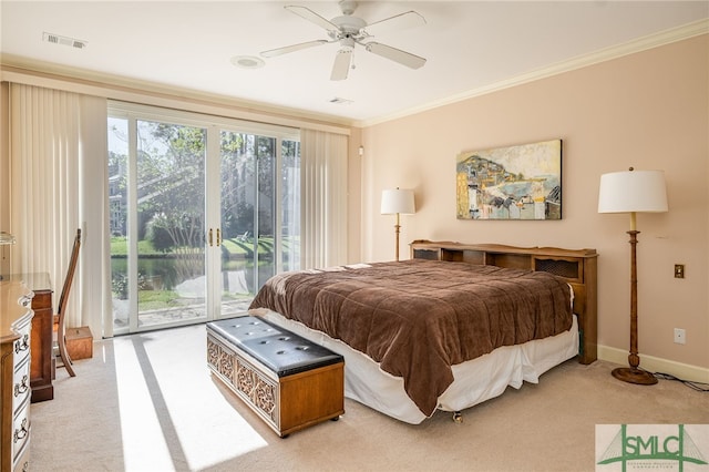 carpeted bedroom with access to outside, ornamental molding, and ceiling fan