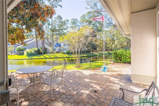 view of patio / terrace featuring a water view