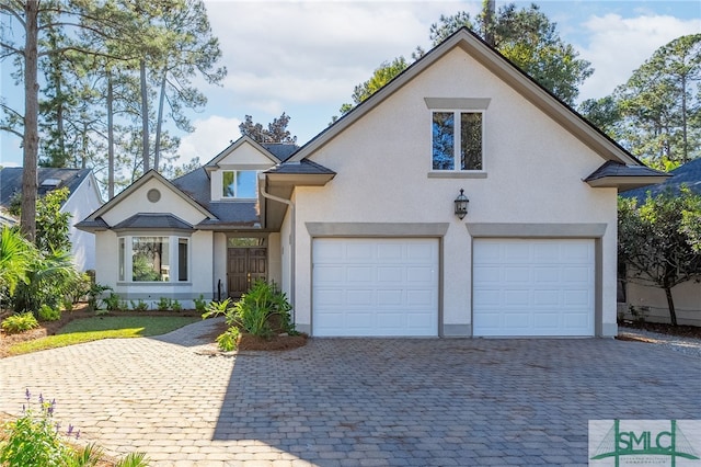 view of front of property with a garage