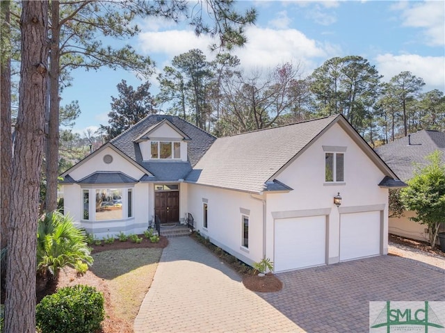 view of front of property featuring a garage