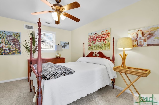 bedroom with ceiling fan and carpet floors