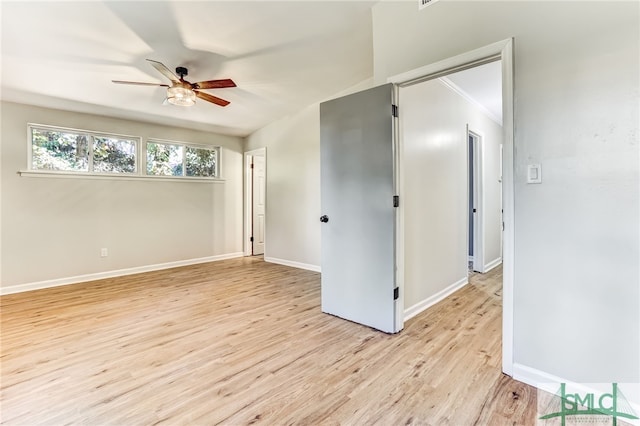 unfurnished room with light hardwood / wood-style floors and ceiling fan