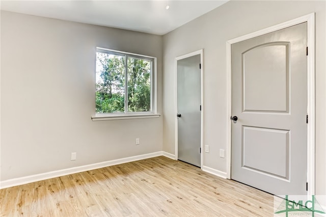 unfurnished bedroom featuring light hardwood / wood-style floors