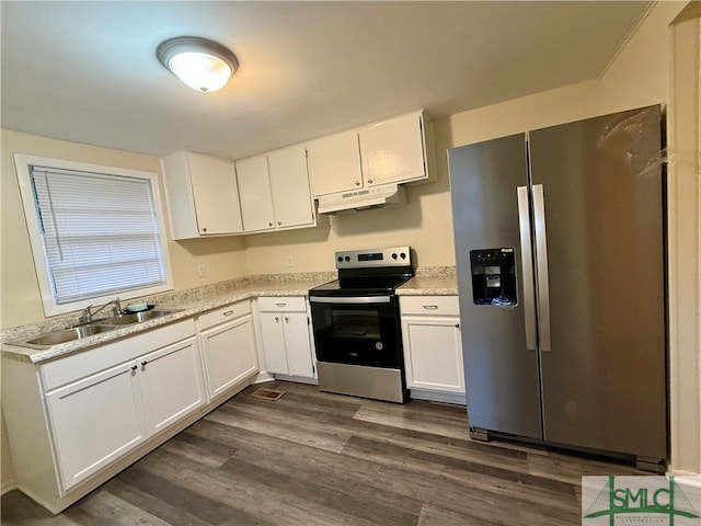 4192 Halcyondale Rd, Sylvania, GA 30467 - kitchen featuring dark wood-type flooring, white cabinets, sink, light stone countertops, and appliances with stainless steel finishes