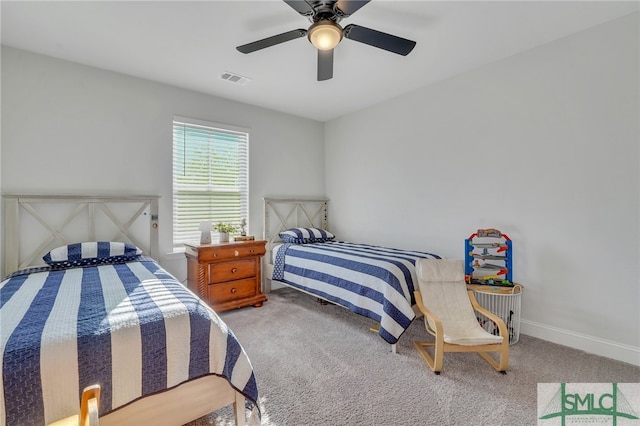 carpeted bedroom featuring ceiling fan