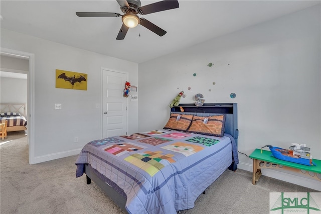 bedroom with light colored carpet and ceiling fan