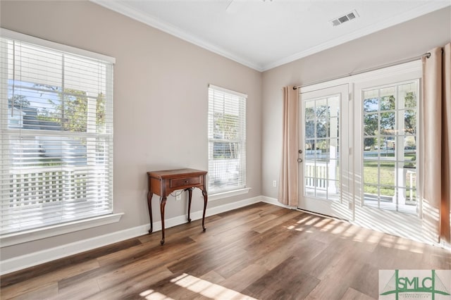 25 Harvest Moon Dr, Savannah, GA 31419 - doorway to outside featuring a wealth of natural light and hardwood / wood-style floors