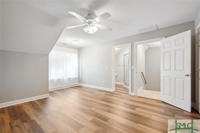 25 Harvest Moon Dr, Savannah, GA 31419 - bonus room with ceiling fan, a textured ceiling, and light wood-type flooring