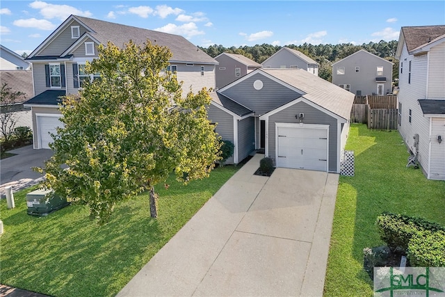 view of front of home featuring a garage and a front lawn