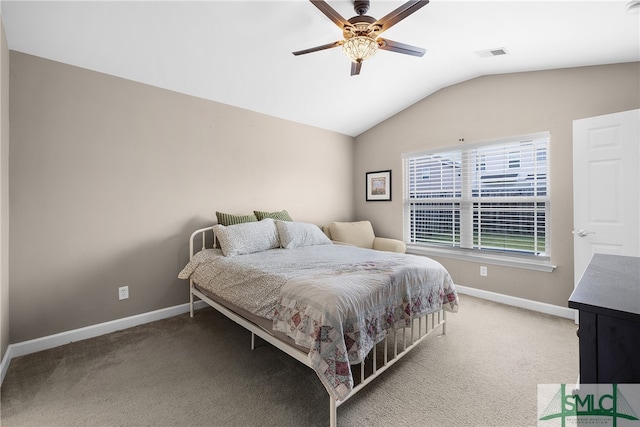 bedroom featuring ceiling fan, carpet floors, and lofted ceiling