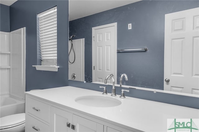 full bathroom featuring vanity, toilet, and shower / bath combination