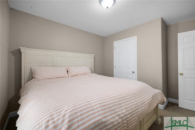 bedroom featuring carpet