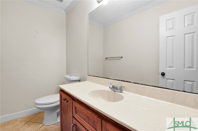 bathroom featuring tile patterned floors, vanity, toilet, and ornamental molding