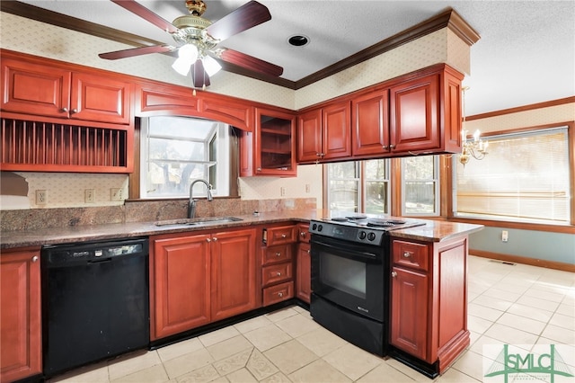 kitchen featuring a healthy amount of sunlight, sink, black appliances, and ornamental molding