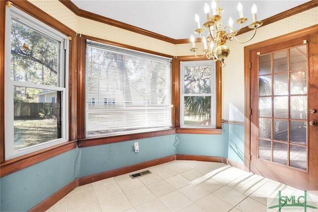 unfurnished sunroom featuring visible vents and a notable chandelier