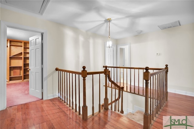 hallway featuring hardwood / wood-style floors