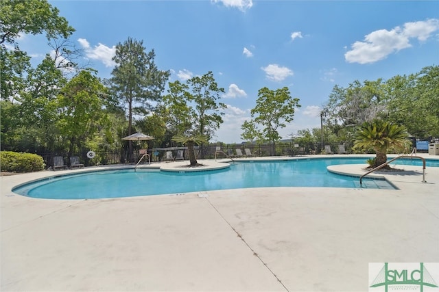 view of swimming pool featuring a patio