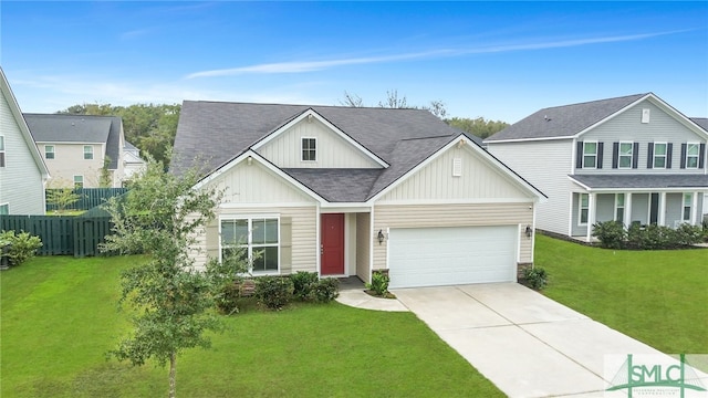 view of front of property with a front lawn and a garage