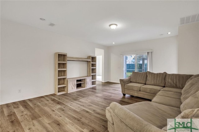 living room with wood-type flooring