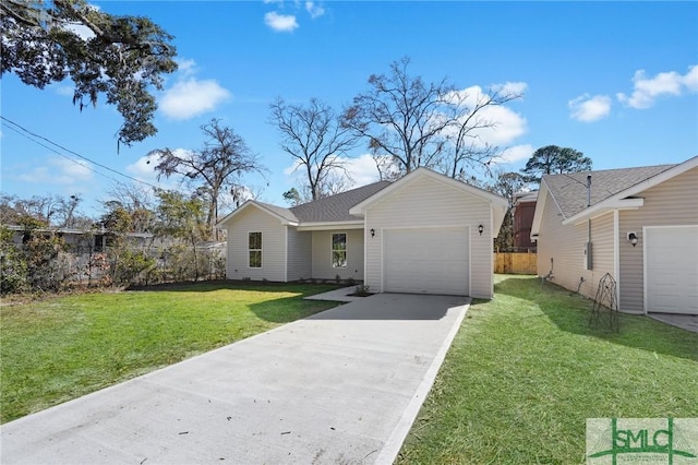 single story home featuring a garage and a front yard