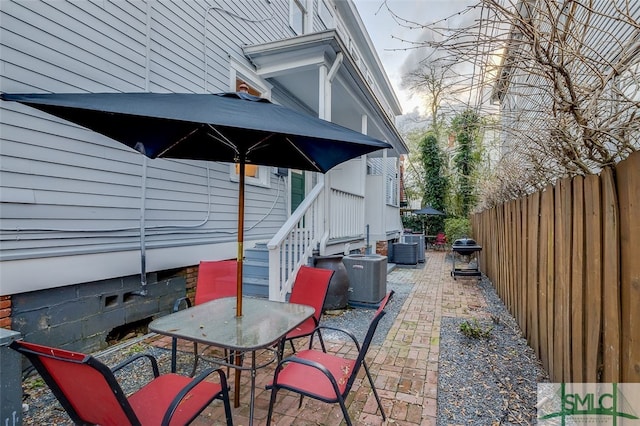 view of patio / terrace with central air condition unit