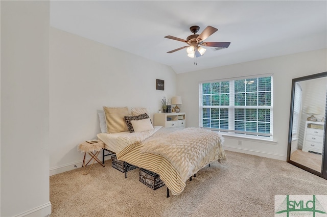 bedroom featuring light colored carpet, ceiling fan, and lofted ceiling