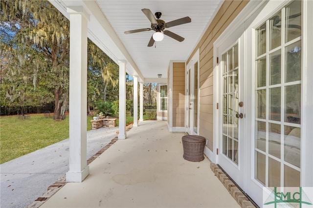 view of patio with ceiling fan and french doors