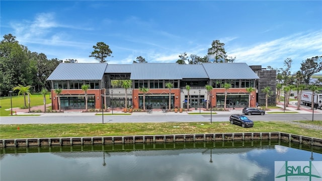 view of property with a water view