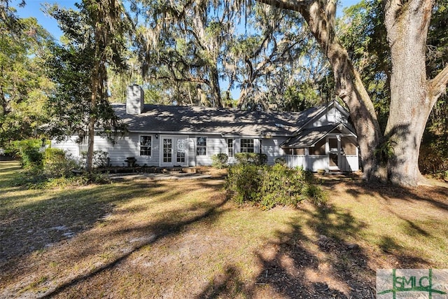 view of front of home with a front yard