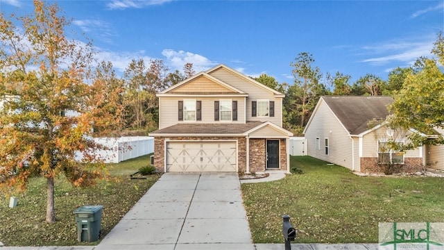 view of front property with a garage and a front lawn