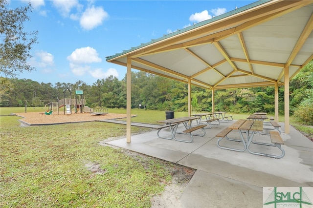 view of property's community with a gazebo, a playground, and a yard