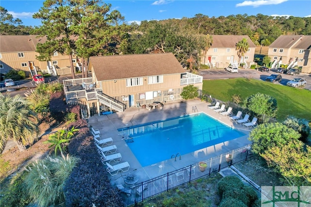 view of swimming pool featuring a patio area