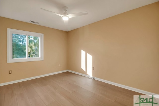 unfurnished room with ceiling fan and light hardwood / wood-style floors