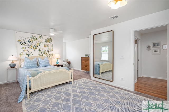 carpeted bedroom with ceiling fan