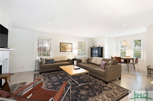 living room with light tile patterned flooring