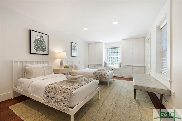 bedroom with hardwood / wood-style flooring