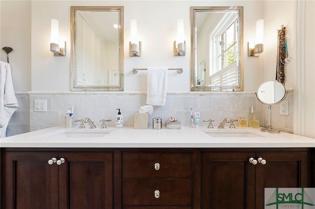 bathroom with vanity and backsplash