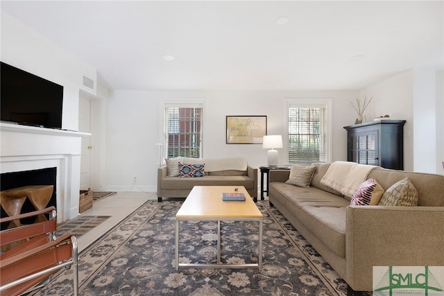 living room with tile patterned flooring