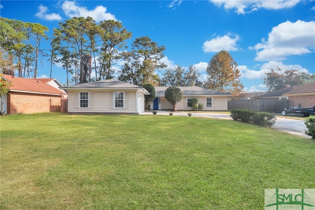 single story home with a front yard