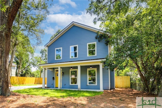 view of front facade featuring ceiling fan and a porch