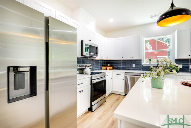 kitchen with white cabinets and stainless steel appliances