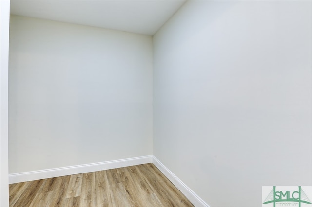 spare room featuring light wood-type flooring