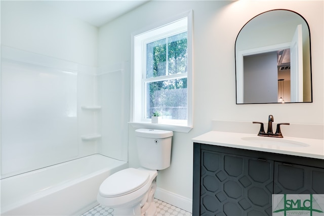 full bathroom with shower / washtub combination, vanity, and toilet