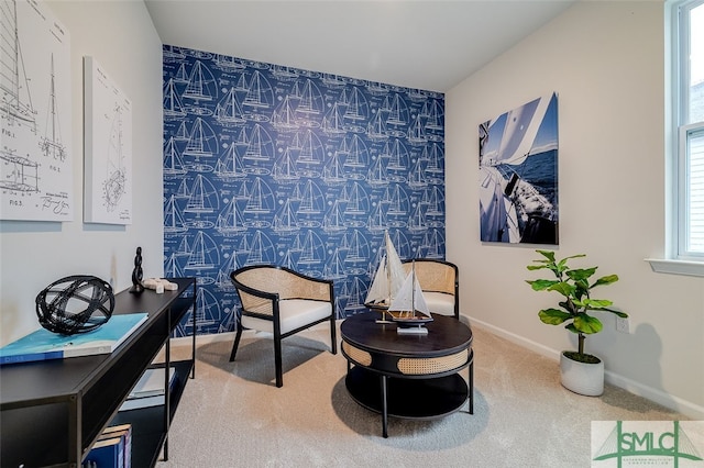 sitting room with carpet flooring