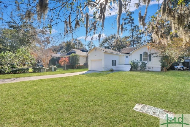 17 S Lake Dr, Savannah, GA 31410 - view of front of home featuring concrete driveway, an attached garage, and a front lawn